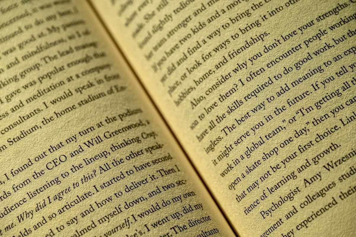 Comma before which shown in close-up printed book text with visible punctuation